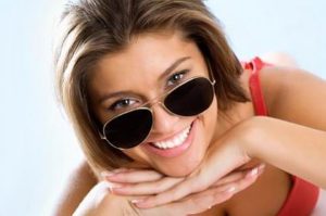 sunglasses with a smile at Riverside Eye Care